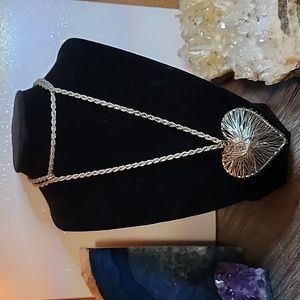 Wire Heart Necklace with 15" drop. Silver toned metal.